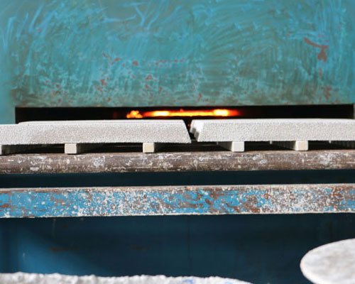 Sintering process of ceramic foam filter boards with supports in a furnace