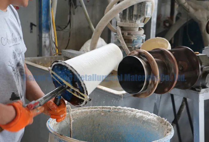 Workers are handcrafting ceramic fiber plugs, ensuring precise dimensions and consistent quality for high-temperature applications.